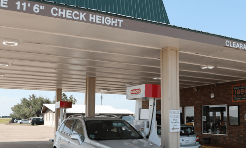 View of covered gas pumps at the Conoco Gas Station